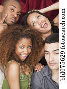 Friends making faces in photo booth