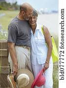 African couple hugging