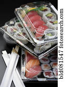 Sushi in takeout containers 
