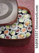 Variety of sushi rolls in box
