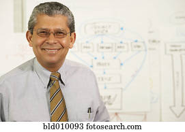 Businessman next to chart