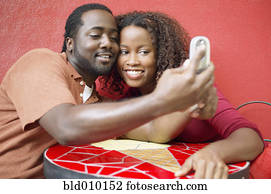 Couple photographing themselves