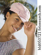 African woman wearing hat