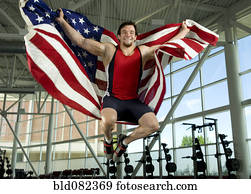 Caucasian athlete jumping with American flag
