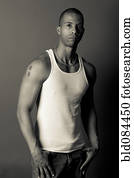 Serious African American man in tank-top