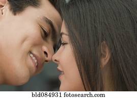 Hispanic couple kissing