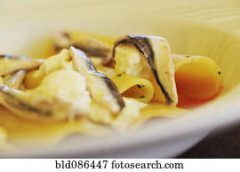 Close up of fish and pasta dish
