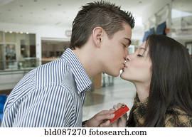 Hispanic couple kissing
