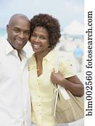 African American couple hugging