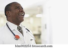 African American male doctor laughing