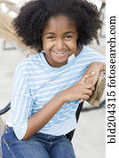 Cape Verdean girl smiling outdoors