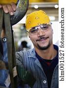 Close up of Hispanic man wearing protective eyewear