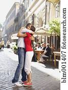Couple hugging outdoors Couple hugging outdoors