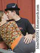 Hispanic couple kissing