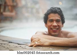 Man sitting in hot tub