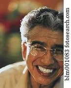 Senior man in eyeglasses laughing Senior man in eyeglasses laughing
