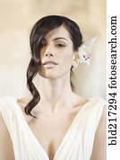 Caucasian woman with glamorous hairstyle