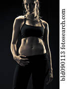 Serious athletic woman in sportswear