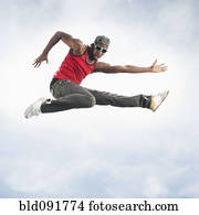 African American man jumping in mid-air