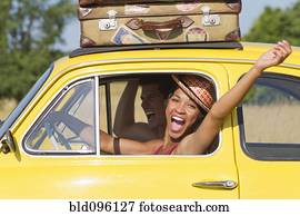 Excited couple on road trip