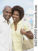 African American couple hugging