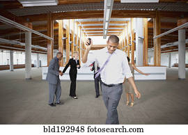 Business people dancing in empty office space