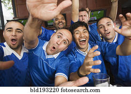 Cheering teammates in sports bar