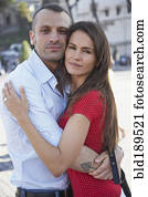 Couple hugging outdoors Couple hugging outdoors