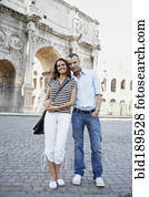 Tourist couple hugging near ruins