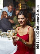 Friends having dinner in restaurant