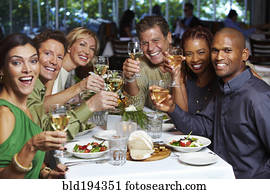 Friends having dinner in restaurant