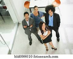 Business people standing together in office