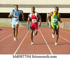 Runners running on track in relay race