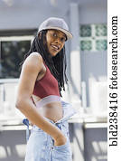 Portrait of casual smiling Mixed Race woman