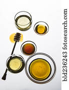 Variety of honey in bowls