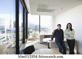 Business people standing together in office