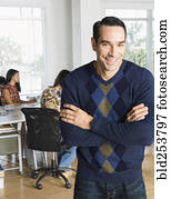 Portrait of confident man in casual office