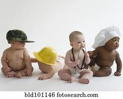 Babies in occupational hats sitting on floor together