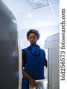 Black hospital technician wearing protective vest