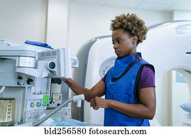 Black hospital technician wearing protective vest