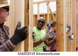 voluntários, segurando, parede, em, local construção