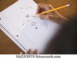 Cape Verdean woman doodling hearts