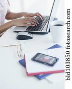 Cape Verdean woman using laptop