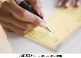 Cape Verdean woman writing a check