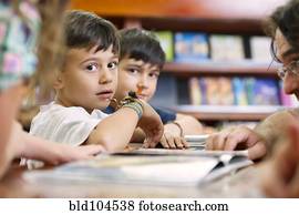 Hispanic students in library