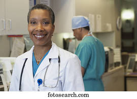 Middle-aged African female doctor smiling, Bethesda, Maryland, United States