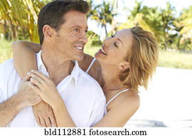 Caucasian couple hugging outdoors Caucasian couple hugging outdoors