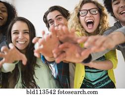 Friends reaching out together