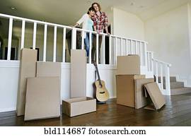 Couple smiling in new home