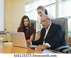 Business people working on laptop